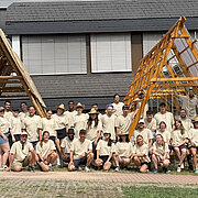 Participants of the 2025 Summer School in front of the pavilions