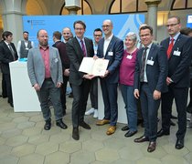Übergabe des Förderbescheids in Berlin