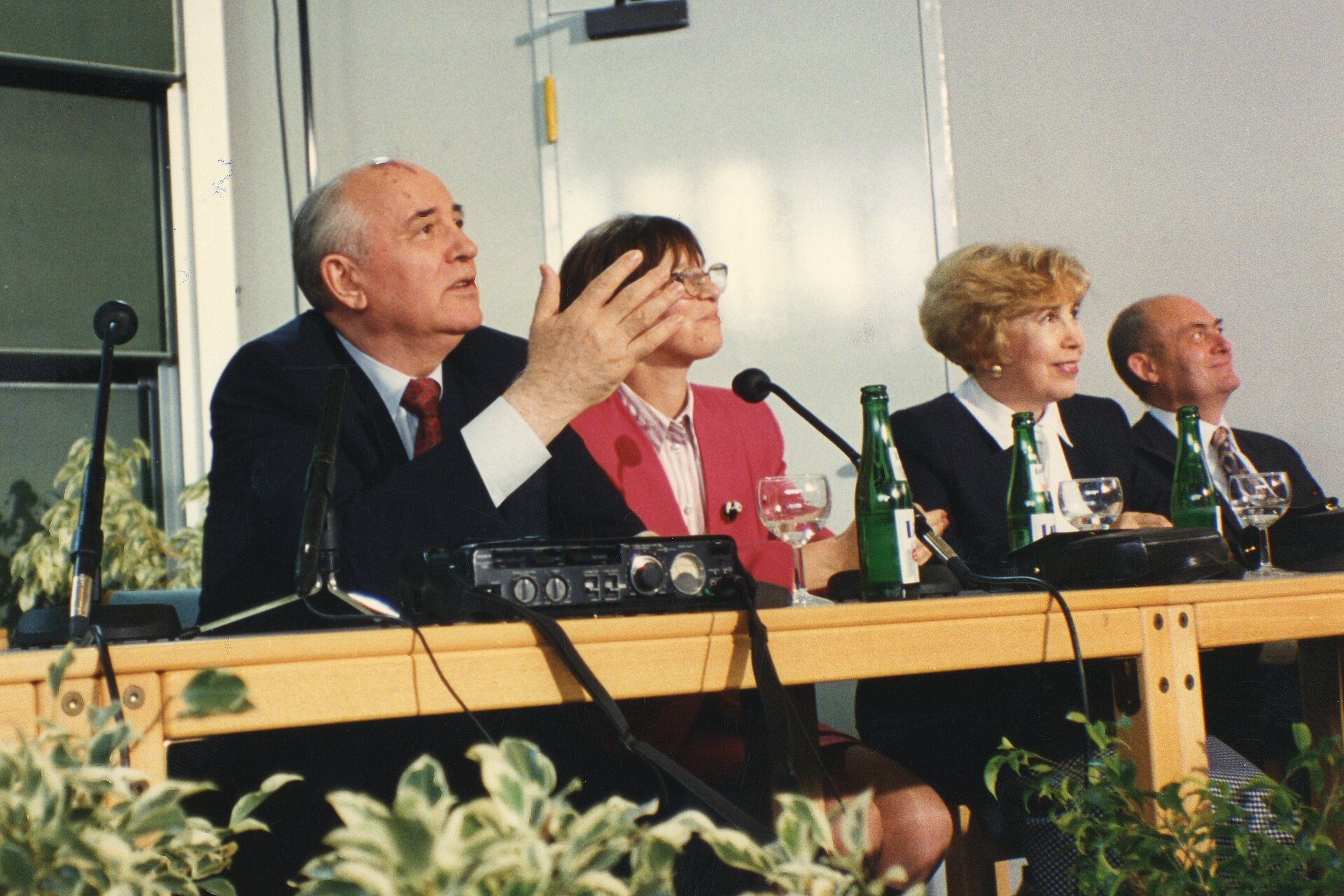 Mikhail S. Gorbachev with other people at the table