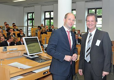 Wiesbadener Versicherungskongress 2014: Prof. Dr. Müller-Reichart und Dr. Axel Wehling, Mitglied der Hauptgeschäftsführung des GDV