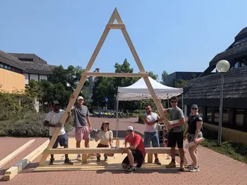Students in front of the first roof structure