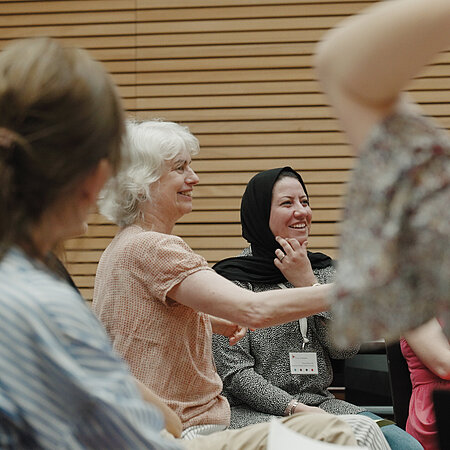 Workshops International Staff Week A group of people in a discussion