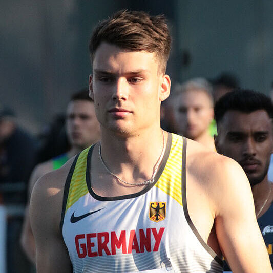 Porträt von Frieder Scheuschner, Leichtathletik Nahaufnahme von Frieder Scheuschner bei einem Wettbewerb im Trikot des Bundeskaders