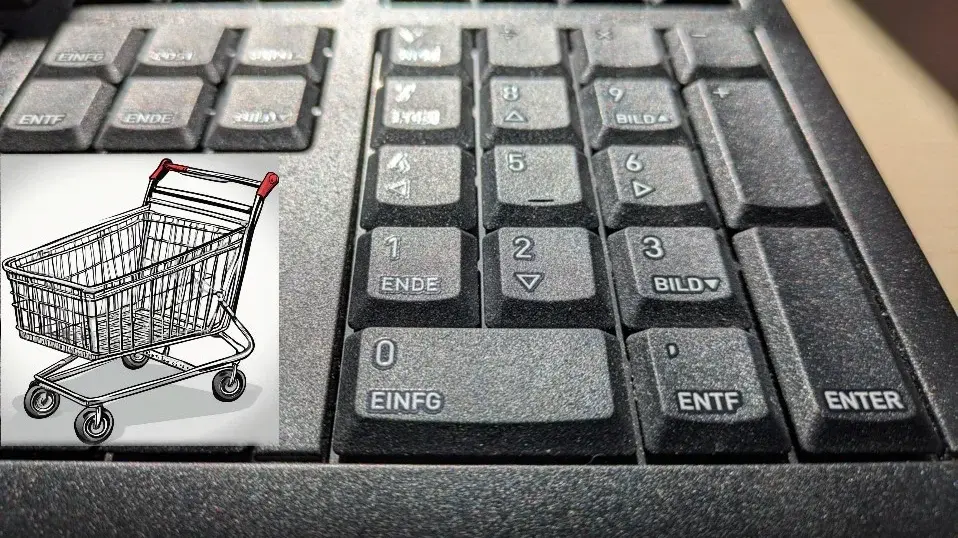 Einkaufswagen links von einem Tastatur Nummernblock