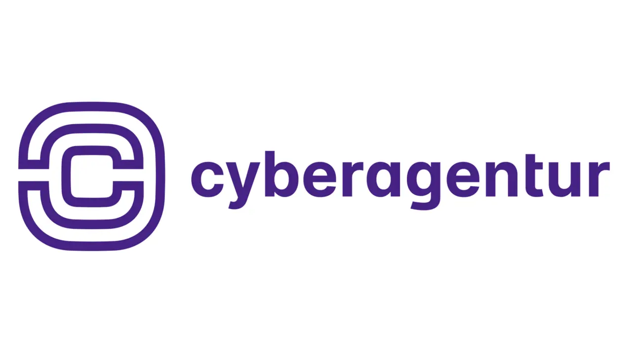 Das Bild zeigt das Logo der Cyberagentur. Es besteht aus einem stilisierten Buchstaben "C" in einer modernen Schriftart und dem Wort "cyberagentur" daneben. Die Farbe des Logos ist lila.