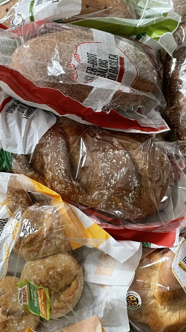 Assorted baked goods packaged in clear plastic bags
