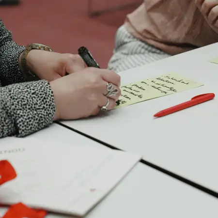 A person taking notes