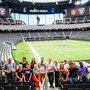Die Teilnehmer:innen des Global Design & Media CoSpace-Projekts im Football Stadium der Las Vegas Raiders.